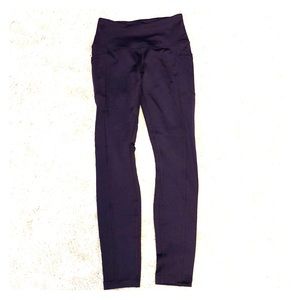 Full-length purple spandex leggings